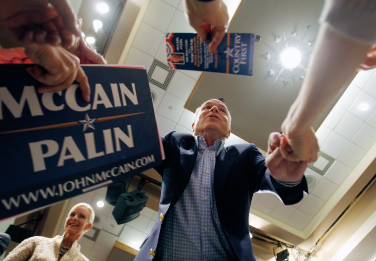 Image: U.S. Republican presidential nominee Senator John McCain greets supporters at a campaign rally in Albuquerque
