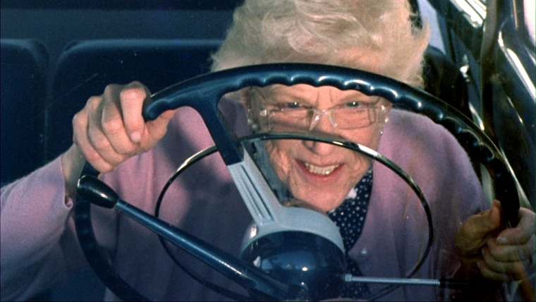 This screengrab from the film “Taking the Wheel” shows actress Patience Cleveland behind the wheel. The film focuses on “the complicated relationship between an obstinate 90-year-old woman who refuses to give up driving, and her well-intentioned son who will stop at nothing to get her off the road,” the film's Web site says.