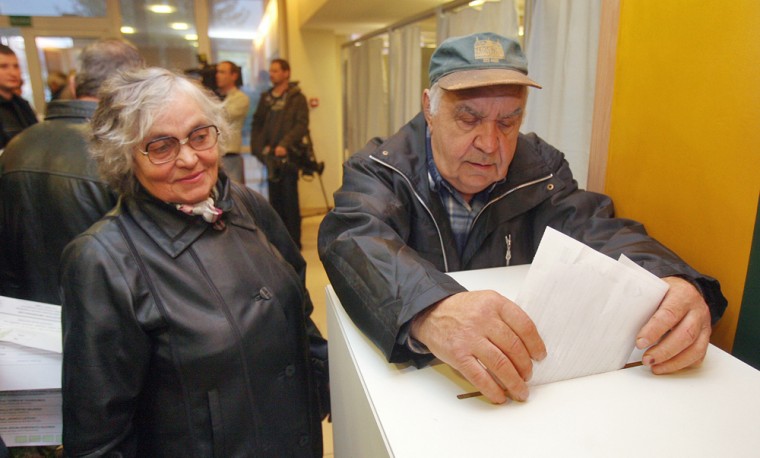 Image: Lithuanians cast their vote during general elections in Vilnius