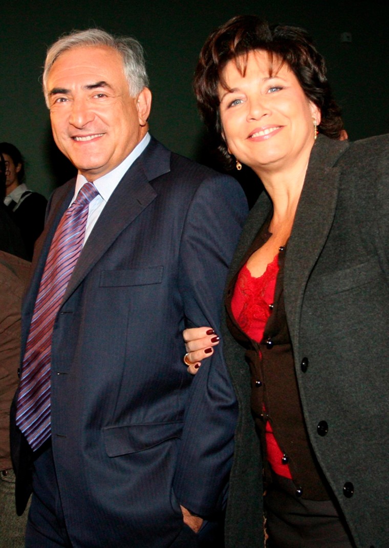 Image: Dominique Strauss-Kahn (L) and his wife Anne Sinclair
