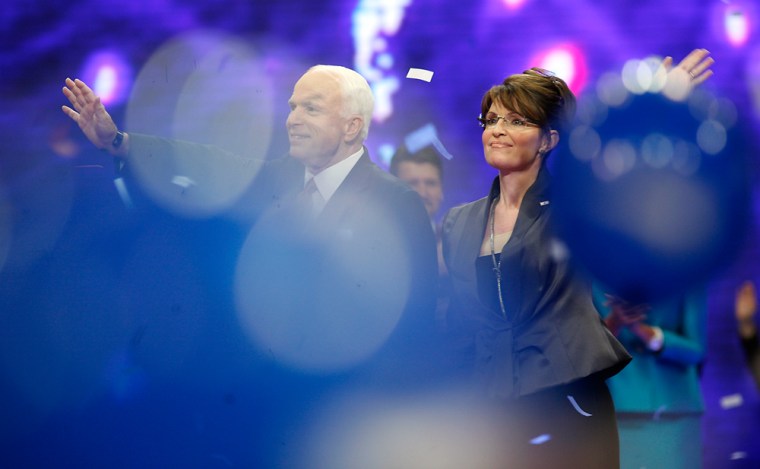 Senator John McCain waves with vice presidential running-mate Governor Sarah Palin at the Republican National Convention in St Paul