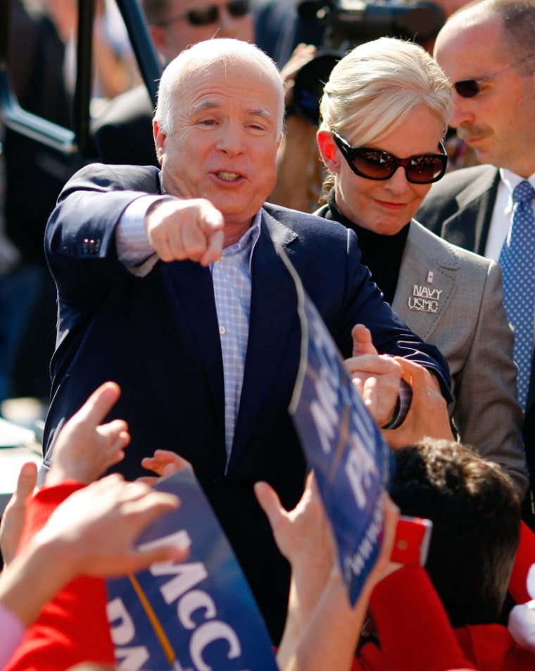Image: U.S. Republican presidential nominee Senator John McCain (R-AZ) and his wife Cindy greet supporters at a campaign rally in Springfield
