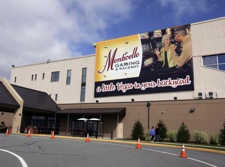 Visitors leave Monticello Gaming and Raceway in Monticello, N.Y. The St. Regis Mohawk Tribe and Empire Resorts, Inc., plan to build a 125-table, 3,500-slot machine casino in Monticello.