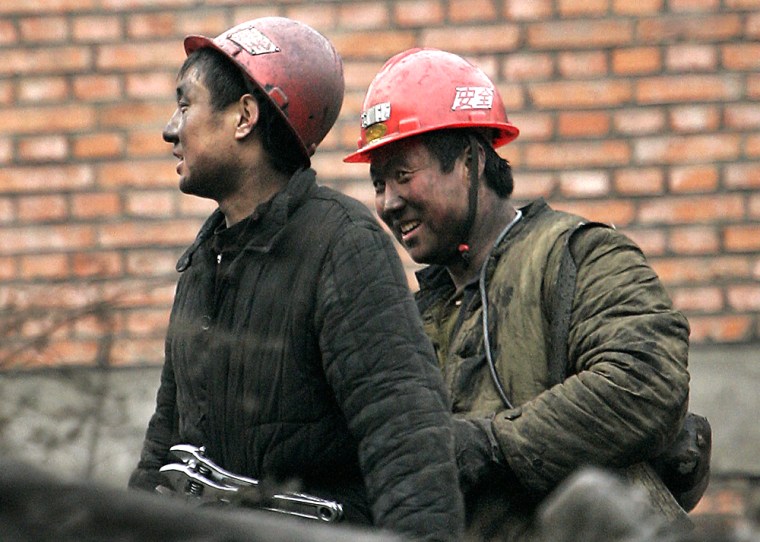 These coal miners in Taiyuan, China, finish a day's work on March 22.