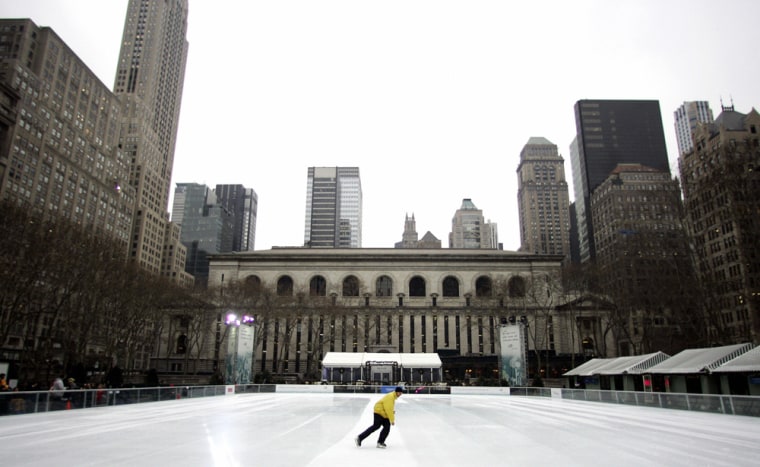 Image: A skater takes to the ice at The Pond in Bryant Park