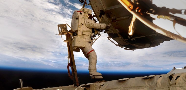 Image: Astronaut performing spacewalk at ISS