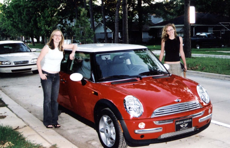 **ADVANCE FOR SUNDAY, NOV. 18**   In this photo provided by Colleen McGraw and taken by Wayne McGraw in May 2004, Colleen McGaw, right, and her sister, Katie, left, stand beside the brand new red Mini Cooper given to Colleen by her parents as a college graduation gift. A year after this picture was taken, Hurricane Katrina hit New Orleans, breaking levees and flooding 80 percent of the city. The car, which was parked at the McGaw family home in the city's Lakeview neighborhood, was submerged in 8 feet of floodwater. (AP Photo/Colleen McGraw)