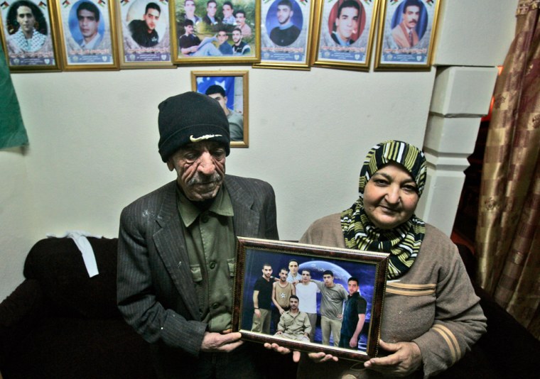 Image: Palestinian Mohammed Naji  and wife Latifah are seen at their home in the West Bank city of Ramallah.