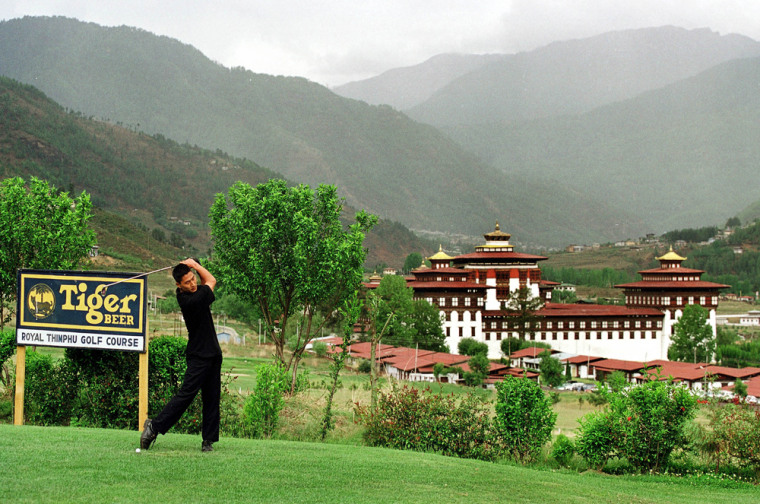 Image: Golfer Takes A Swing At The Royal Thimpu Golf Course May 20 2000 In Thimpu Bhutan Th