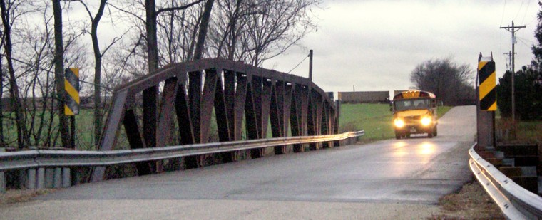 Image: School bus approaching bridge