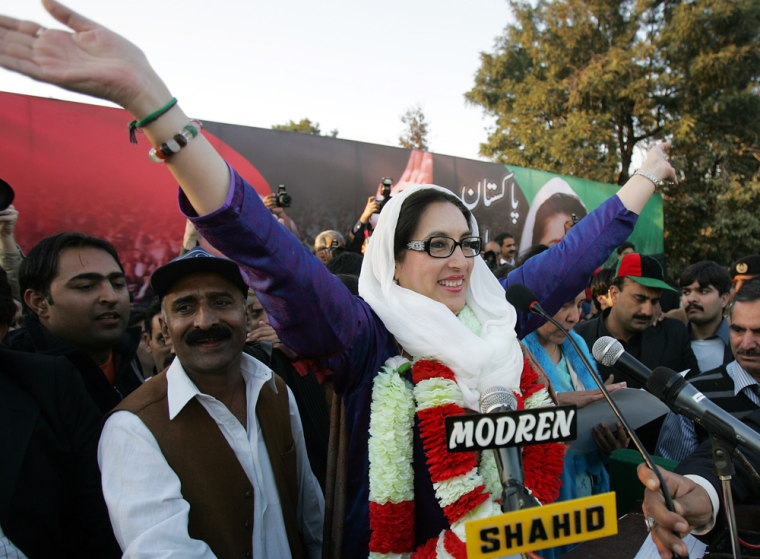 Image: Pakistani former premier Benazir Bhutto waves to her supporters at an election compaign rally in Rawalpindi where she was later killed by a suicide attack.