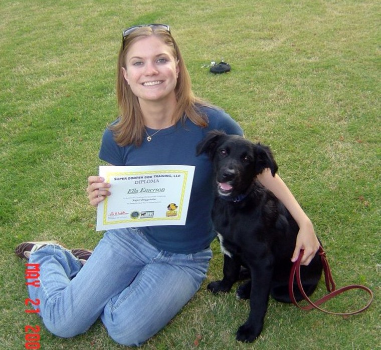 Meredith Emerson is seen with her dog Ella, in Flowery Branch, Ga. The 24-year-old hiker was found dead.