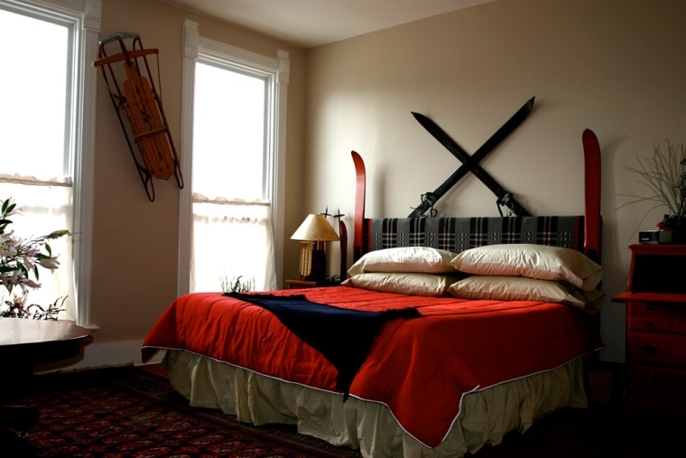 Image: A room at the Broadway Hotel in Philipsburg, Mont. with an old-fashioned sled and skis on the walls