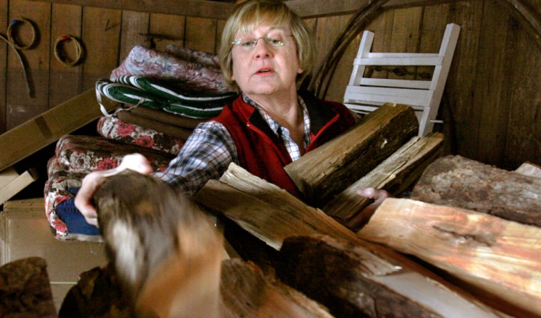 Image: Lea Wait gets an armful of wood