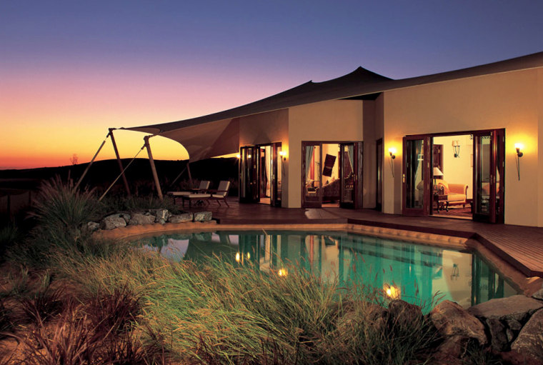 The architecture of the Al Maha Desert Resort follows the traditional style of buildings around dry riverbeds or oases. At $1,090 per night, each of the 32 tented suites is outfitted with antiquities, hand-crafted furniture, rugs and carpets, and a private pool. Activities include falconry, camel-riding and archery