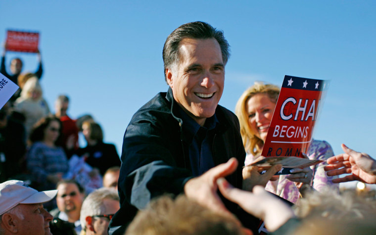 Image: Republican presidential candidate Romney greets supporters at campaign rally in Florida