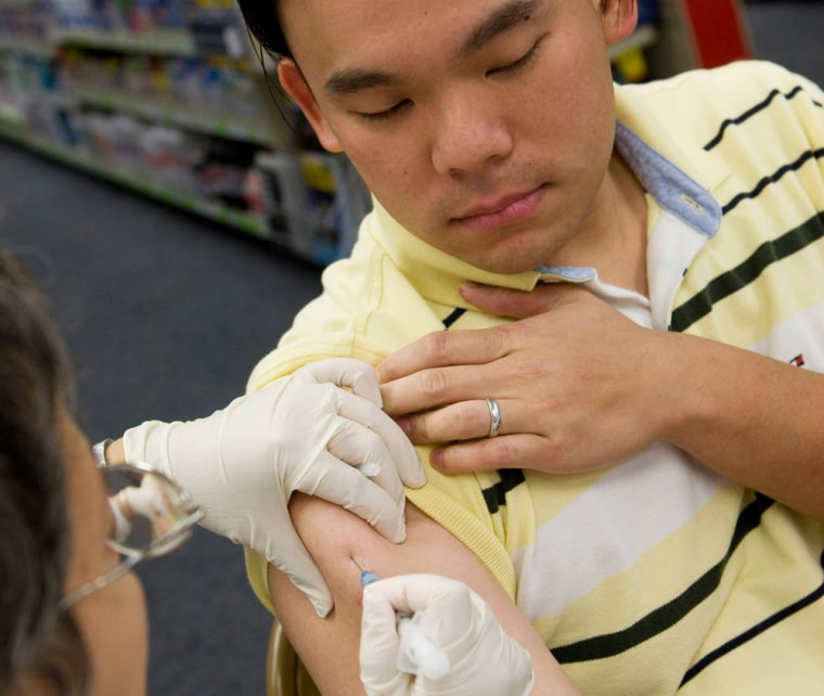 Image: Michael Li gets a flu vaccination