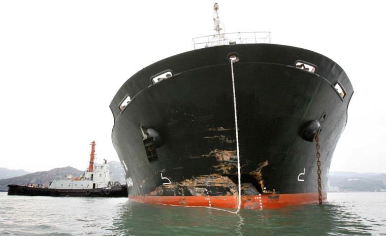 Image: A cargo ship's damaged hull after colliding with a tug