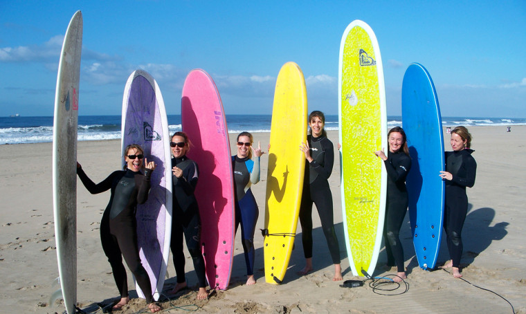 Image: Women with surfboards