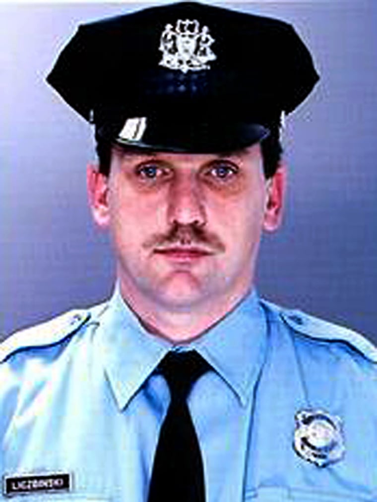 Officer Steven Liczbinski, 40, here in an undated photo, was shot and killed with an assault weapon after a bank robbery in the Port Richmond section of Philadelphia on Saturday, authorities said. 