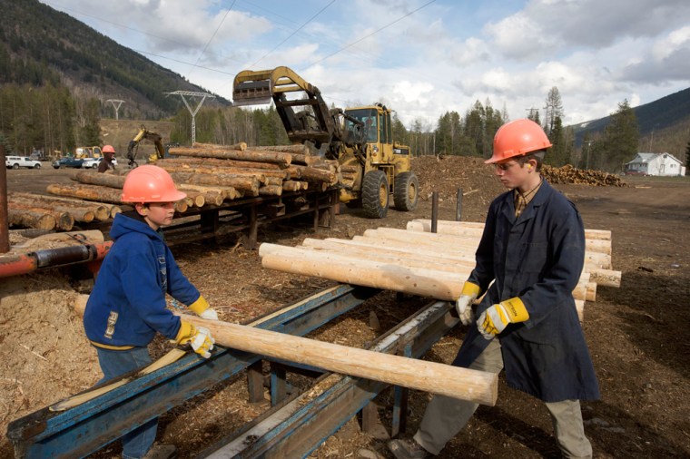 Image: Preparing fence posts in Kitchener, British Columbia