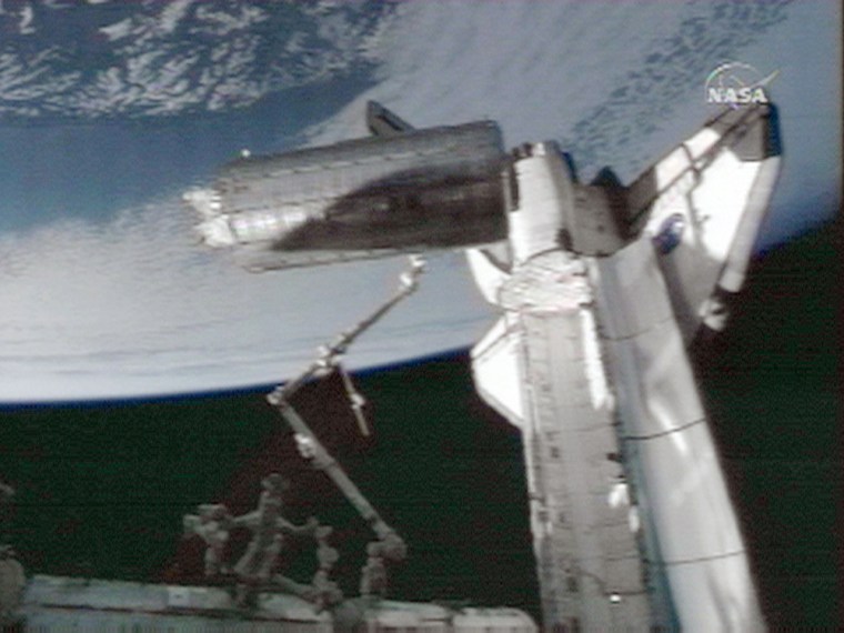 Image: Japanese Kibo Module moved from shuttle Discovery