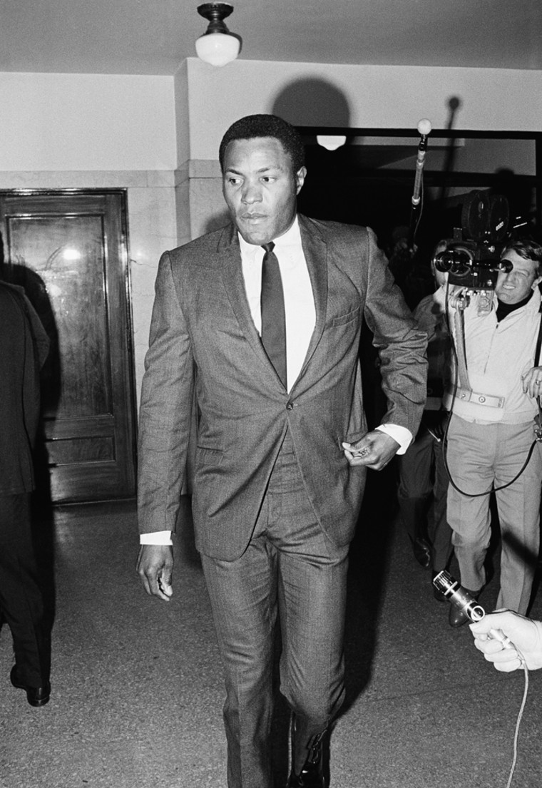Rafer Johnson, former Olympic decathlon champion who was with Sen. Robert F. Kennedy the night he was assassinated, arrived at  the Los Angeles Hall of Justice February 18, 1969 to testify in the trial of Srihan Bishara Sirhan, accused of the killing. (AP Photo)