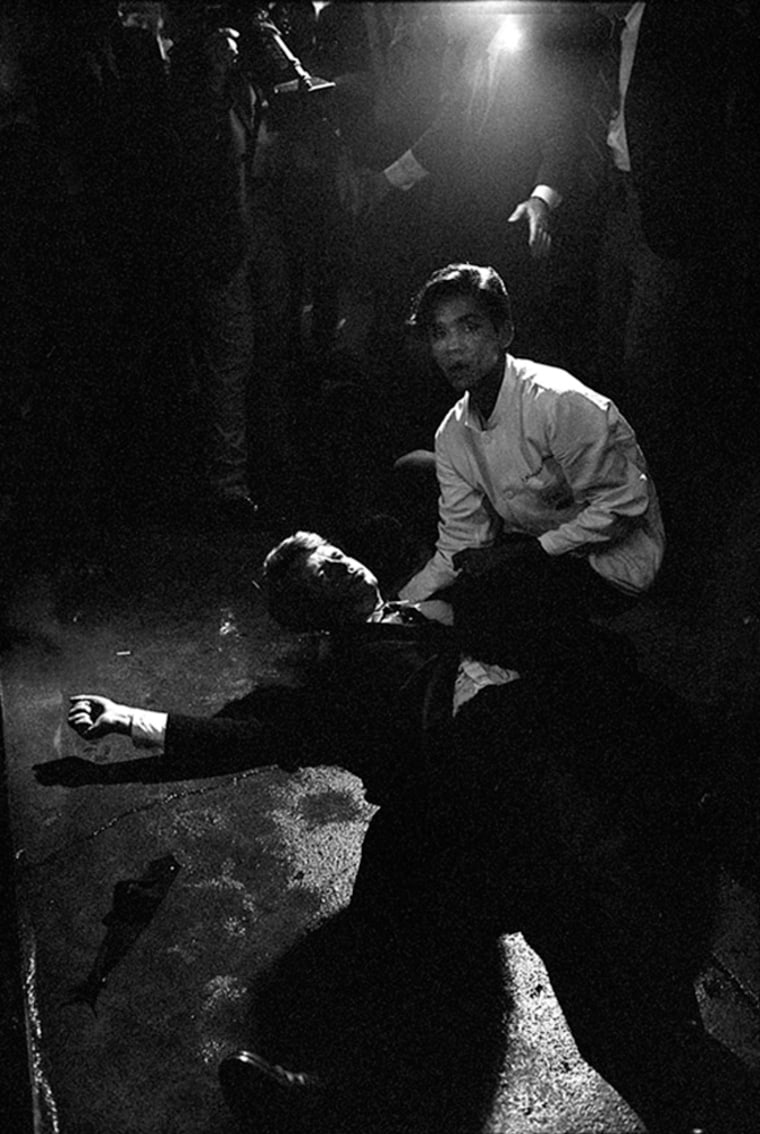 Image: Juan Romero holds Robert F. Kennedy moments after he was shot