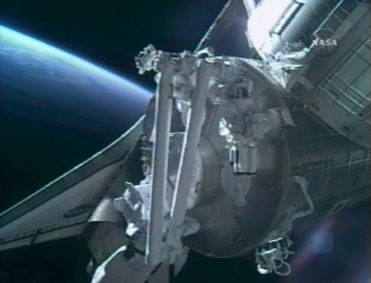Image: Discovery docking with the International Space Station