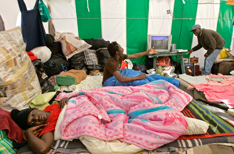 Image: Zimbabwe nationals in a make shift refugee camp near Cape Town