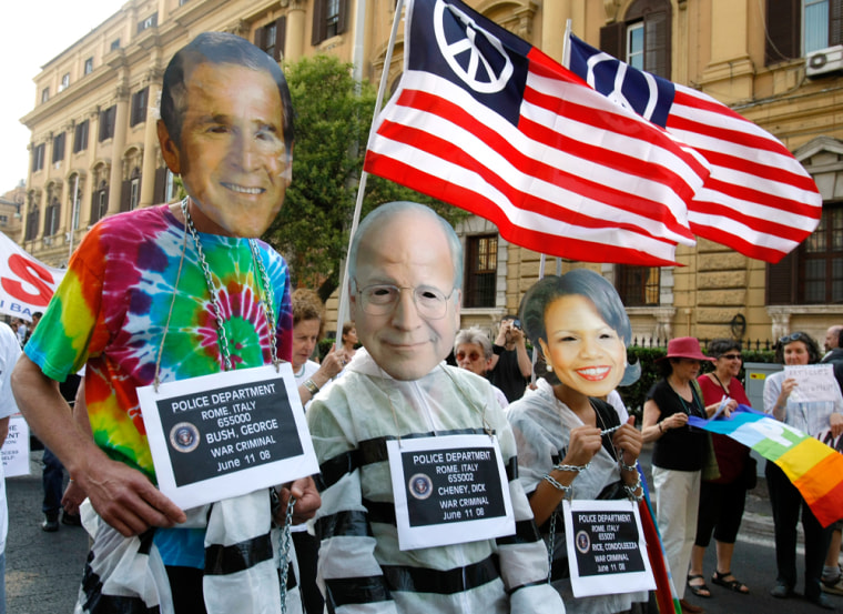 Image: Peace activists wear masks of Bush, Cheney and Rice