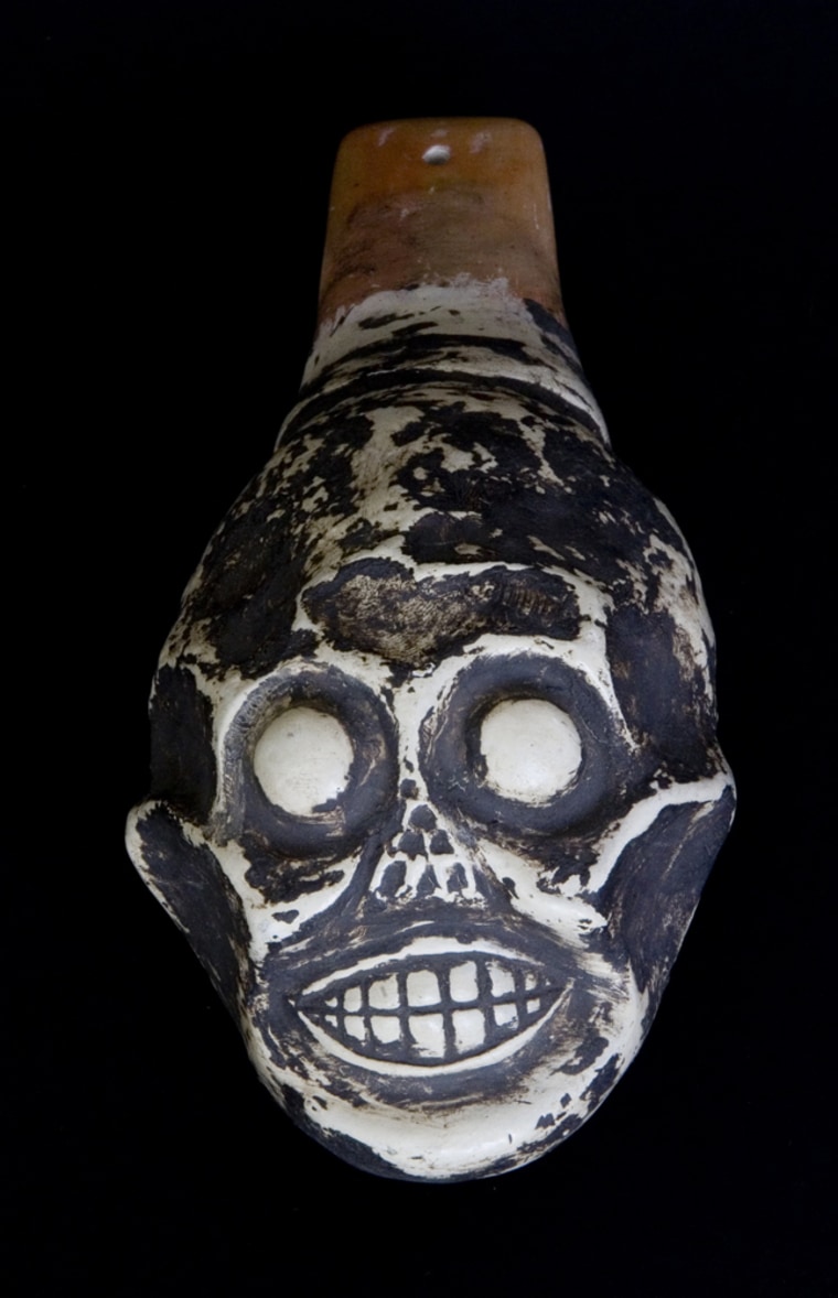 Image: A replica of a skull shaped whistle