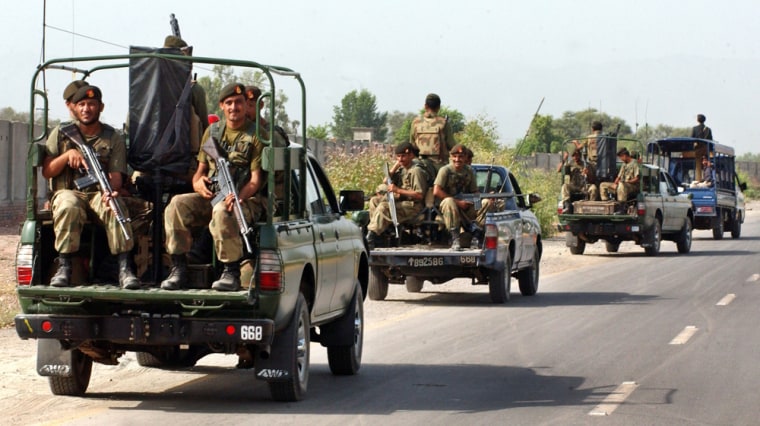 Image: Pakistani troops patrol on vehicles at Hayatabad near the Khyber tribal agency
