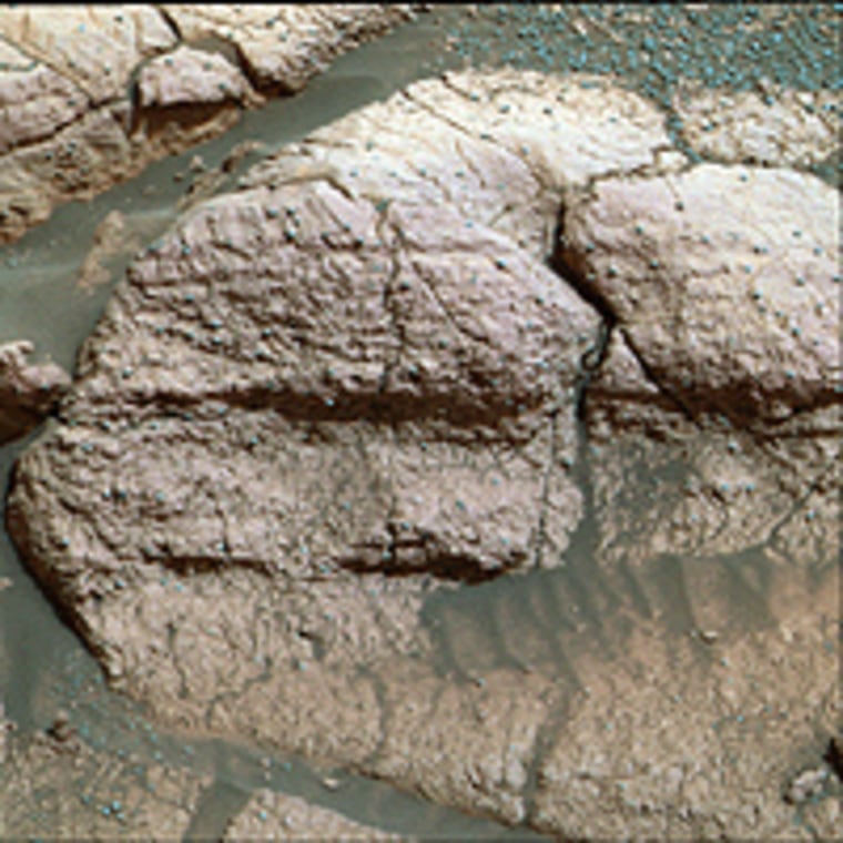 This image, taken by the panoramic camera on the Mars Exploration Rover Opportunity, shows a close up of the rock dubbed \"El Capitan,\" which contains jarosite. The discovery of jarosite at the rover's landing site helped scientists determine that the region once contained liquid water. Credit: NASA/JPL