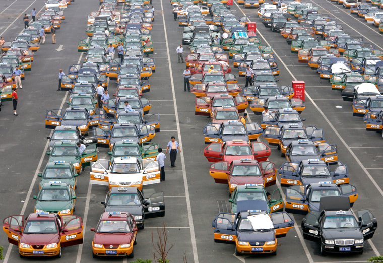 Image: Taxi drivers at Beijing Capital International Airport