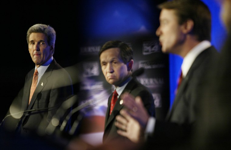John Kerry, left, and Dennis Kucinich, center, listen as John Edwards answers a question during a Democratic debate in Milwaukee Sunday.