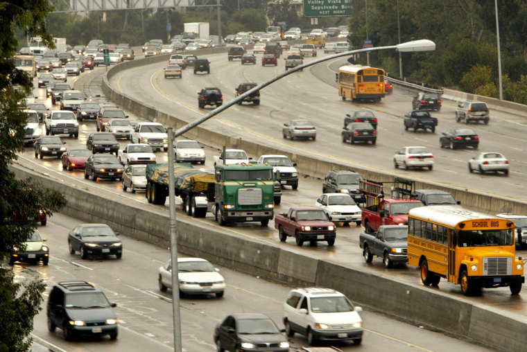 Traffic begins to back up at the intersection of Interstate 405 and U.S. 101 Wednesday in the Sherman Oaks section of Los Angeles. The intersection has been deemed one of the worst in the country.