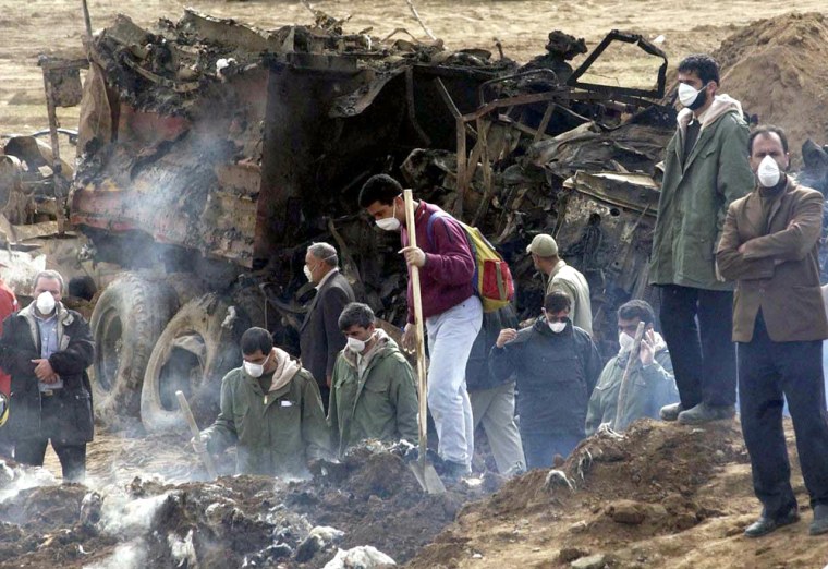 Rescuers on Thursday search debris at the site of the train explosion, which occurred near Neyshabur, 435 miles east of Tehran.
