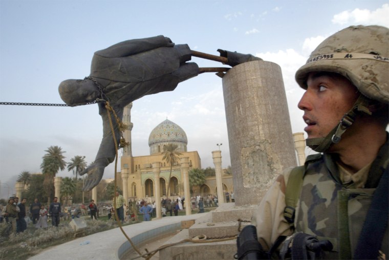 FILE PHOTO OF TOPPLING OF STATUE OF PRESIDENT SADDAM HUSSEIN FALL IN CENTRAL BAGHDAD