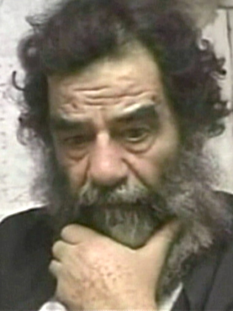 This photograph of Saddam Hussein after his capture was shown Sunday at a news conference in Baghdad.
