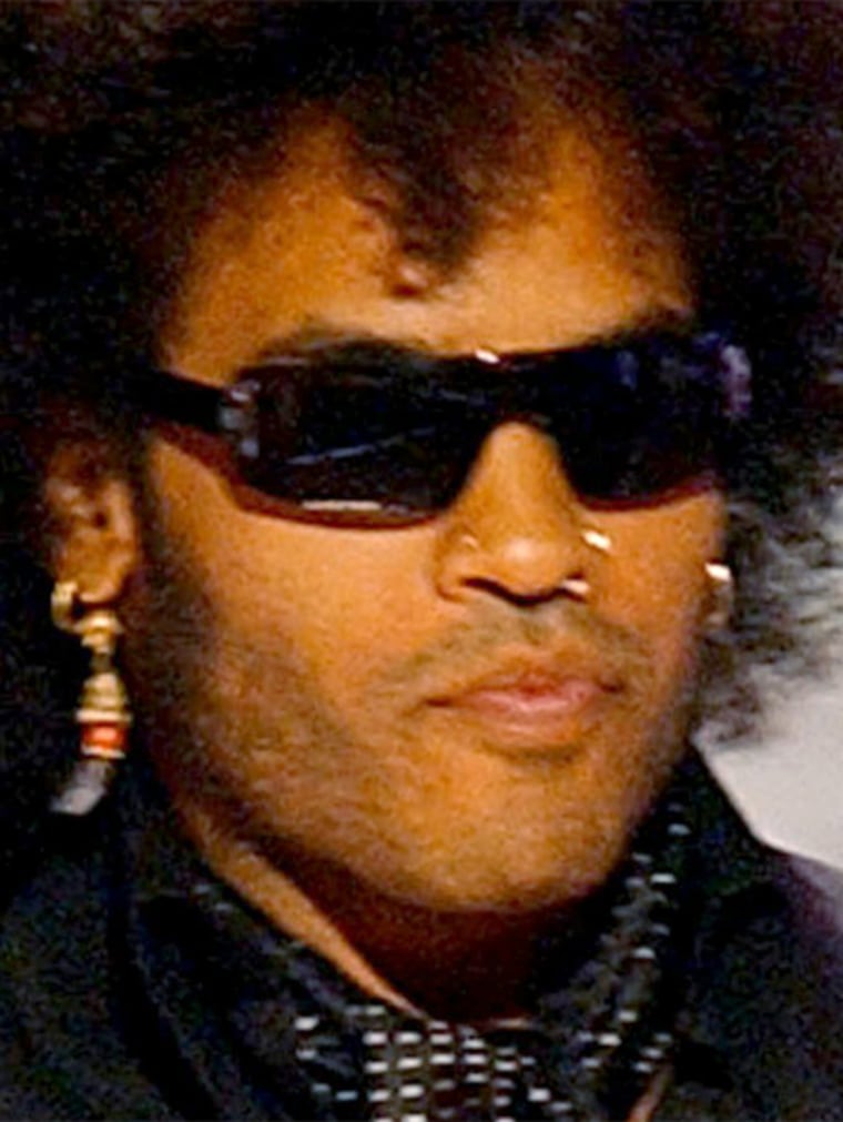 ** FILE ** Lenny Kravitz, shown at the VH1/Vogue Fashion Awards at New York's Radio City Music Hall, in this, Oct. 15, 2002 file photo,  is the latest singer to release a song in response to the war in Iraq.``We Want Peace,'' available only on the Rock the Vote Web site, also features Iraqi pop singer Kadim Al Sahir, Palestinian musician Simon Shaheen and Jamey Hadded of Lebanon on percussion. (AP Photo/Mark Lennihan, File)