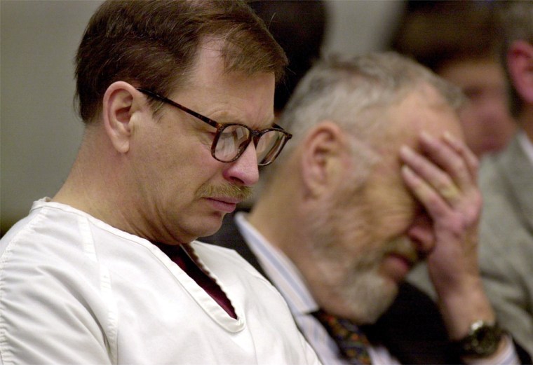 Gary Ridgway listens in court Thursday as relatives of his victims describe their pain. 