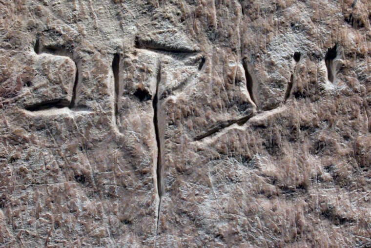 In this close-up, an inscription in Hebrew reading "Ya'acov," or James, is seen on an ancient box used to bury human bones.