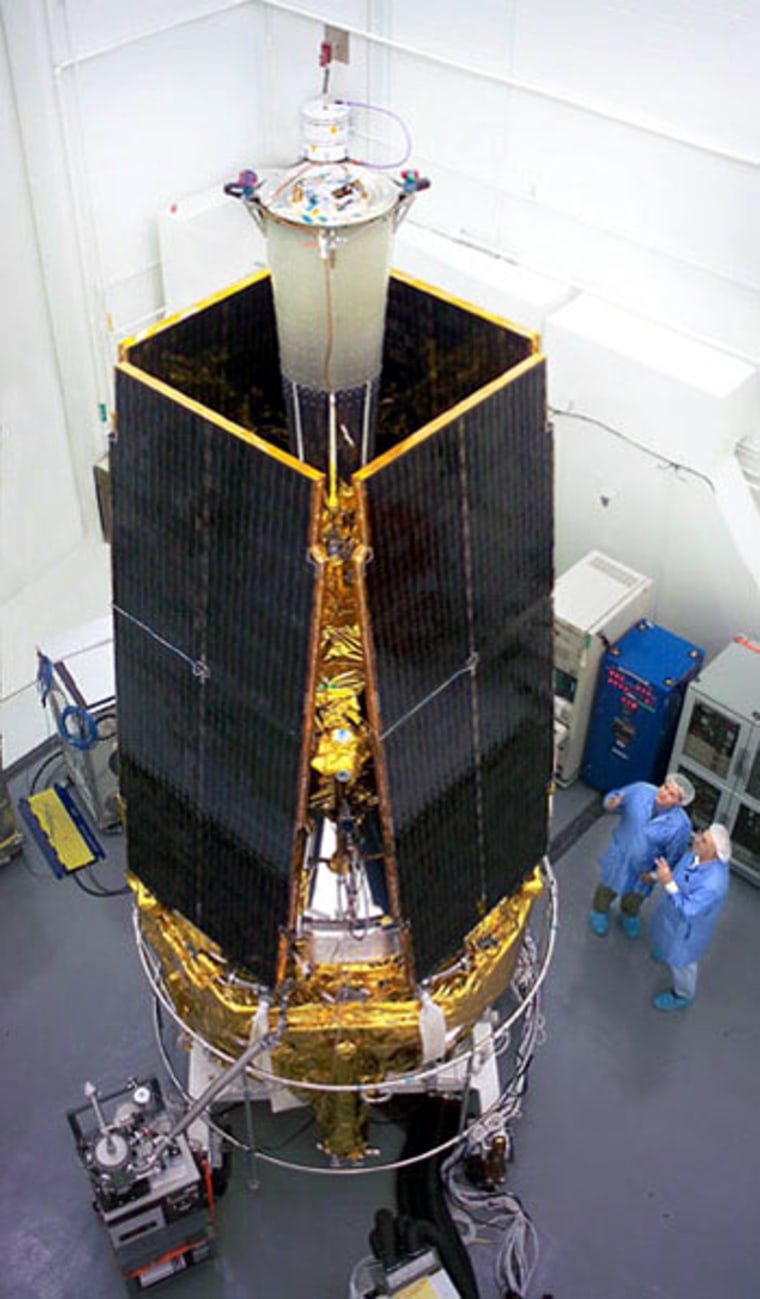 Gravity Probe B sits in a processing room at Vandenberg Air Force Base in California. The spacecraft's launch was postponed in November due to a technical snag.