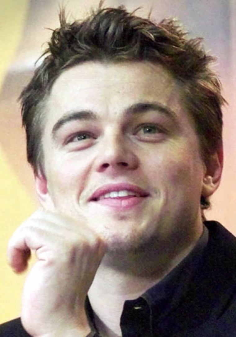 FILE--Leonardo DiCaprio during a news conference in Berlin, Germany in this file photo on February 12, 2000. DiCaprio plans to shoot a science-fiction movie in Romania this summer, with parts to be filmed in the palace of former dictator Nicolae Ceausescu, Monday, April 10, 2000. (AP Photo/ Markus Schreiber, File)