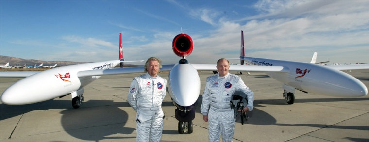 BRANSON AND FOSSETT STAND WITH RECORD ATTEMPTING PLANE AT UNVEILING IN U.S. DESERT