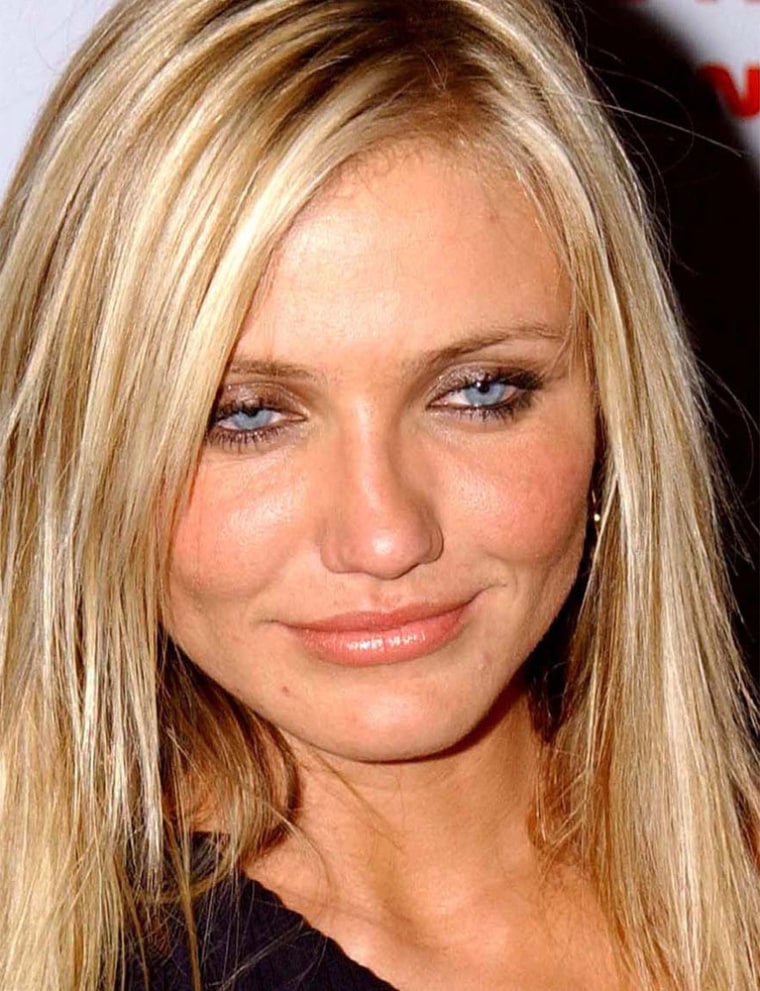 **FILE**Cameron Diaz attends a movie premiere on June 25, 2003 in New York. A photographer who allegedly used topless photos of  Diaz in an attempt to extort $3.3. million from her must stand trial. A Los Angeles judge Thursday Nov. 20,2003,  scheduled an arraignment Dec. 8 for  John Rutter of Los Angeles  on felony charges of attempted extortion, attempted grand theft, forgery and perjury. (AP Photo/Jennifer Graylock,file)