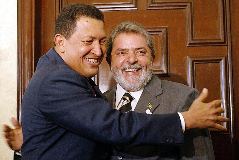 In this picture provided by the Brazilian government, Venezuela's President Hugo Chavez, left, hugs Brazilian President Luiz Inacio Lula da Silva, right, before their bilateral meeting during the Special Summit of the Americas in Monterrey, Mexico, Monday, Jan. 12, 2004. (AP Photo/Agencia Brasil, Ricardo Stuckert)