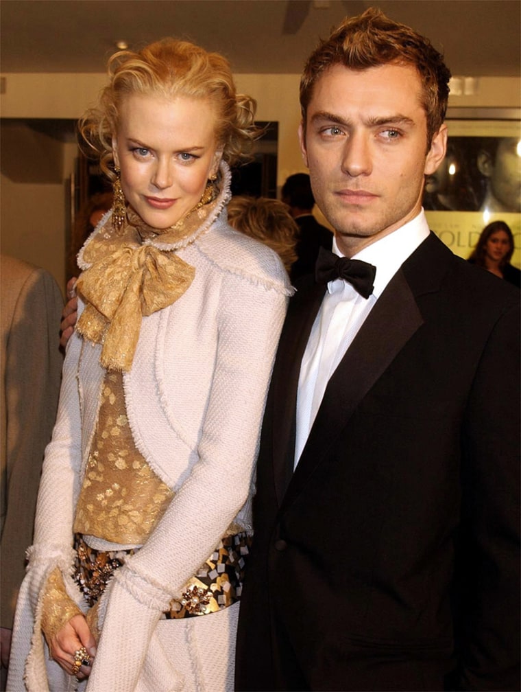 Actors Jude Law, right, and Nicole Kidman arrive for the Royal European Charity Premiere of their new film, \"Cold Mountain\" in central London Sunday, Dec. 14,  2003. (AP Photo/John Stillwell, Pool)
