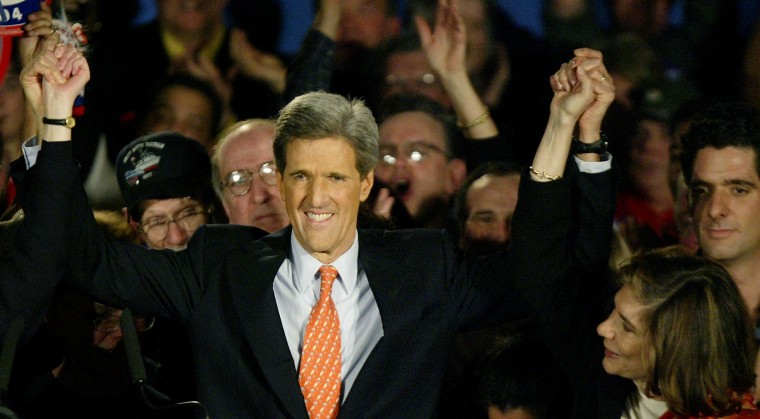 DEMOCRATIC PRESIDENTIAL CANDIDATE KERRY AND WIFE WAVE TO SUPPORTERS